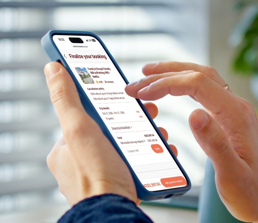 A Stayhub booking on a phone, showing the cancellation policy and the trip dates with an edit link beside them